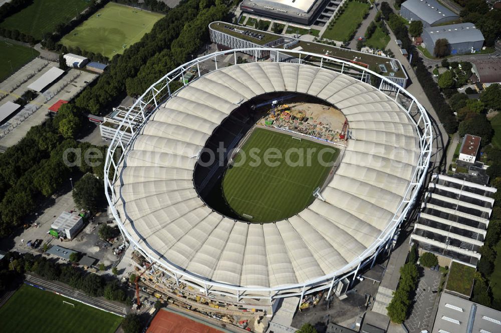 Stuttgart from the bird's eye view: Blick auf die Umbauarbeiten am Stadion Stuttgart( Mercedes-Benz-Arena) zu einem reinen Fußballstadion. Während des Umbaus, Bauherr ist die Stadion NeckarPark GmbH & Co. KG, wird sich die Kapazität auf 39.000 Plätze reduzieren, die Kosten des Projekts belaufen sich auf rund 60 Millionen Euro. Für zusätzliche 13,15 Millionen Euro wird außerdem unter der Untertürkheimer Kurve eine Sporthalle entstehen. Ausführende Firma ist die BAM Deutschland AG. View of the reconstruction of the stadium Stuttgart (Mercedes-Benz-Arena) to a football-only stadium.