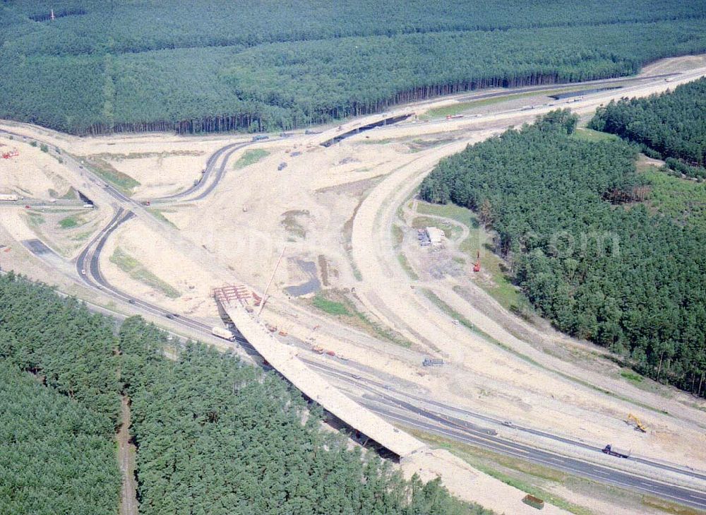 Zernsdorf / Brandenburg from the bird's eye view: Umbau- und Erweiterungs-Baustelle des Autobahndreieck Spreeau, ist ein Autobahndreieck am südöstlichen Berliner Ring (A 10), das nach Osten die A 12 nach Frankfurt anbindet.Das Dreieck wurde bereits 1937 erbaut und von 1998 bis 2000 umgebaut. Dabei wurde die Hauptrasse, die A 10, auf sechs Spuren erweitert.