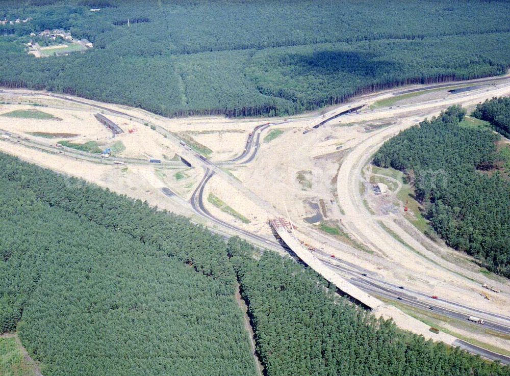 Zernsdorf / Brandenburg from the bird's eye view: Umbau- und Erweiterungs-Baustelle des Autobahndreieck Spreeau, ist ein Autobahndreieck am südöstlichen Berliner Ring (A 10), das nach Osten die A 12 nach Frankfurt anbindet.Das Dreieck wurde bereits 1937 erbaut und von 1998 bis 2000 umgebaut. Dabei wurde die Hauptrasse, die A 10, auf sechs Spuren erweitert.