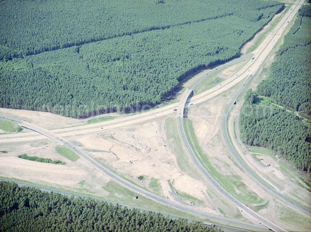 Zernsdorf / Brandenburg from the bird's eye view: Umbau- und Erweiterungs-Baustelle des Autobahndreieck Spreeau, ist ein Autobahndreieck am südöstlichen Berliner Ring (A 10), das nach Osten die A 12 nach Frankfurt anbindet.Das Dreieck wurde bereits 1937 erbaut und von 1998 bis 2000 umgebaut. Dabei wurde die Hauptrasse, die A 10, auf sechs Spuren erweitert.