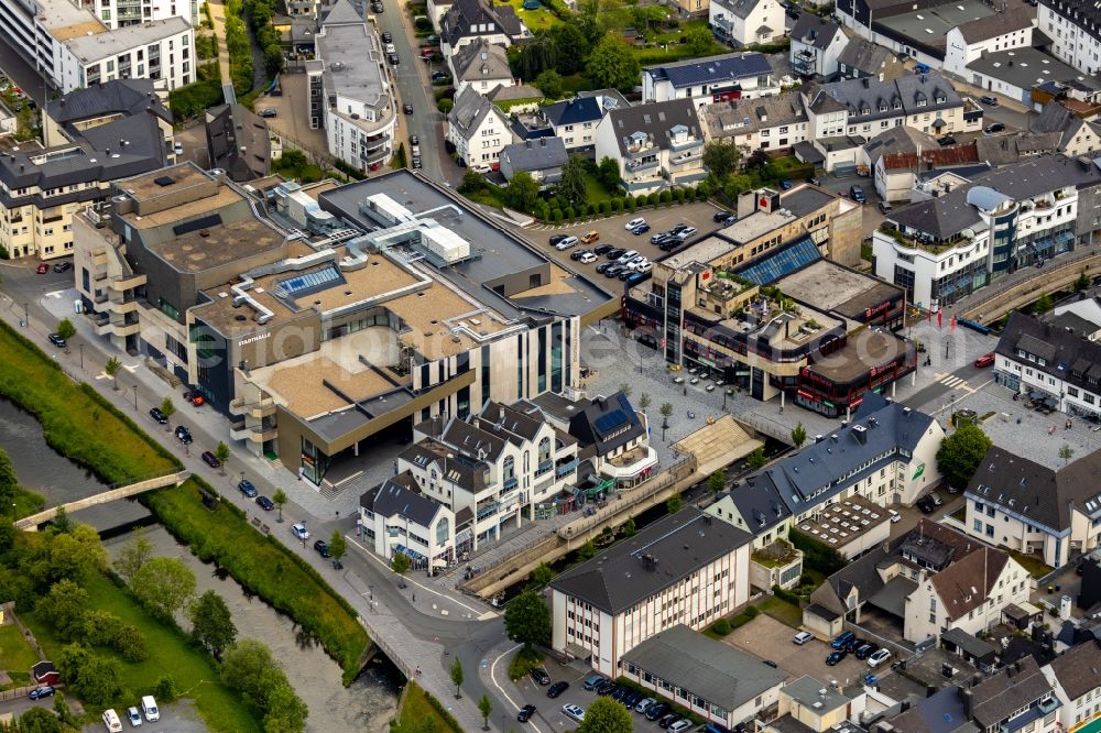 Meschede from the bird's eye view: Revitaliset shopping center in the former department store building HERTIE on Winziger Platz in Meschede in the state North Rhine-Westphalia, Germany