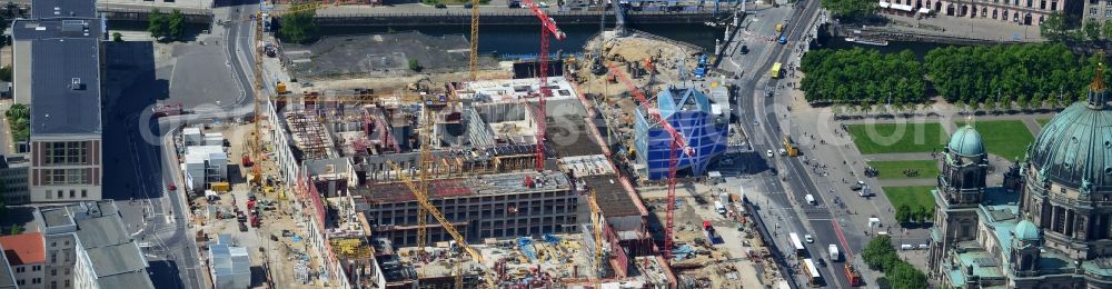 Berlin from the bird's eye view: View of the construction site for the new building the largest and most important cultural construction of the Federal Republic, the building of the Humboldt Forum in the form of the Berlin Palace