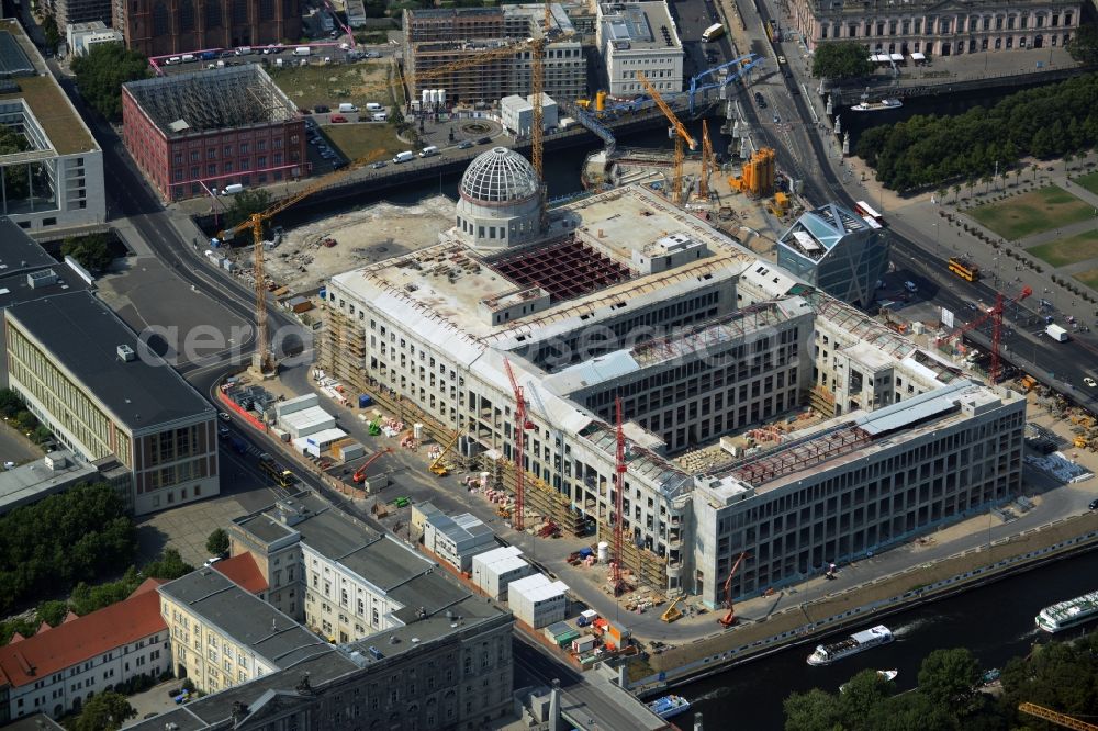 Berlin from the bird's eye view: View of the construction site for the new building the largest and most important cultural construction of the Federal Republic, the building of the Humboldt Forum in the form of the Berlin Palace