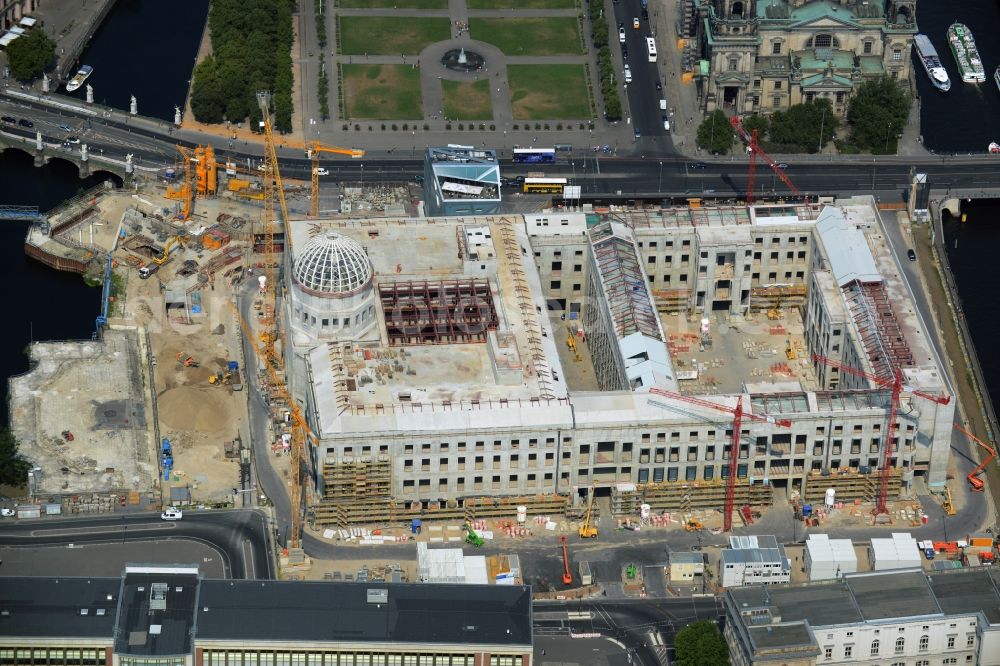 Berlin from the bird's eye view: View of the construction site for the new building the largest and most important cultural construction of the Federal Republic, the building of the Humboldt Forum in the form of the Berlin Palace