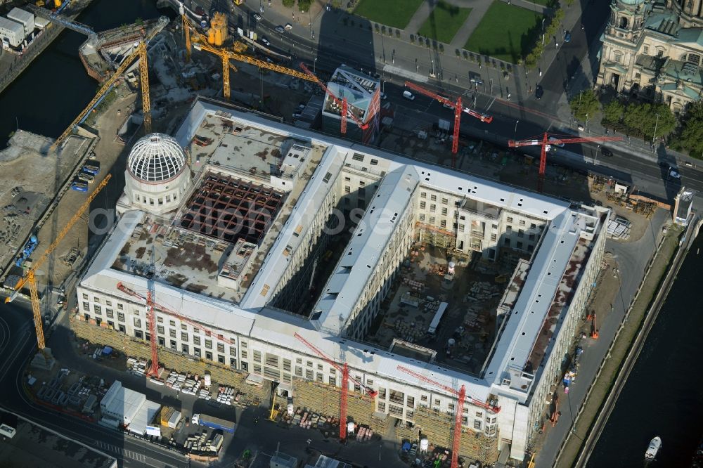 Berlin from the bird's eye view: View of the construction site for the new building the largest and most important cultural construction of the Federal Republic, the building of the Humboldt Forum in the form of the Berlin Palace