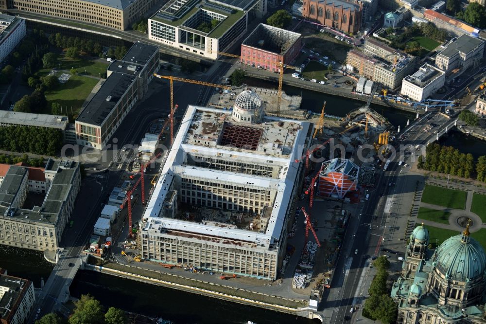 Berlin from the bird's eye view: View of the construction site for the new building the largest and most important cultural construction of the Federal Republic, the building of the Humboldt Forum in the form of the Berlin Palace