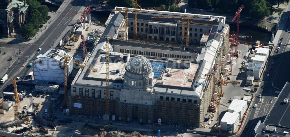 Berlin from the bird's eye view: View of the construction site for the new building the largest and most important cultural construction of the Federal Republic, the building of the Humboldt Forum in the form of the Berlin Palace