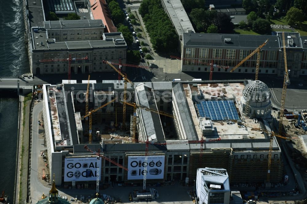 Berlin from above - Construction site for the new building the largest and most important cultural construction of the Federal Republic, the building of the Humboldt Forum in the form of the Berlin Palace