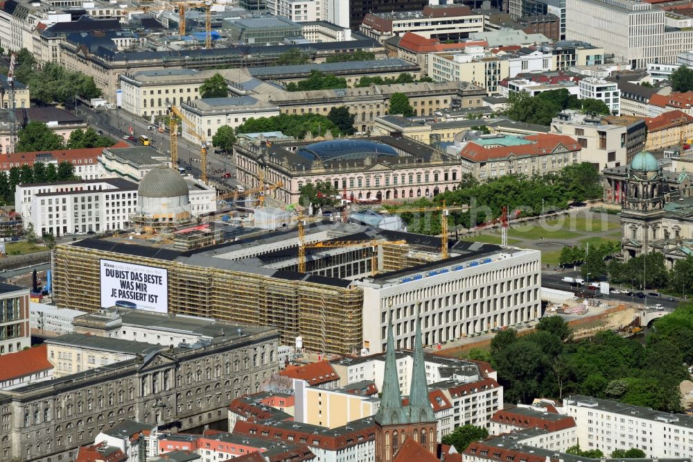 Berlin from above - Construction site for the new building the largest and most important cultural construction of the Federal Republic, the building of the Humboldt Forum in the form of the Berlin Palace