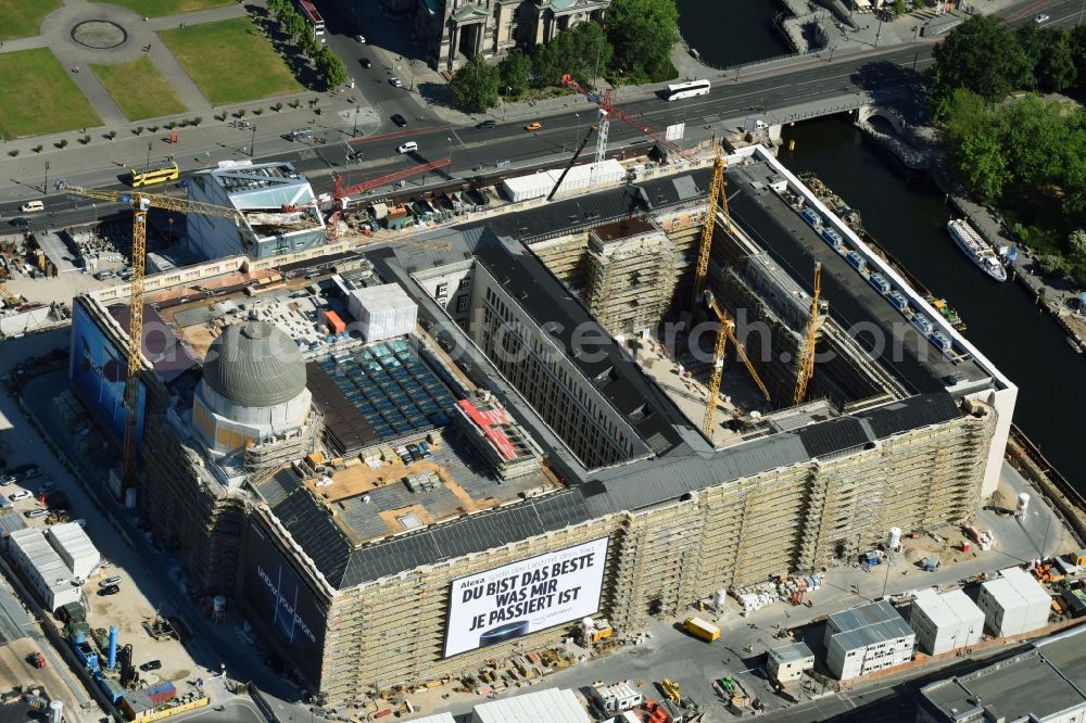 Berlin from the bird's eye view: Construction site for the new building the largest and most important cultural construction of the Federal Republic, the building of the Humboldt Forum in the form of the Berlin Palace