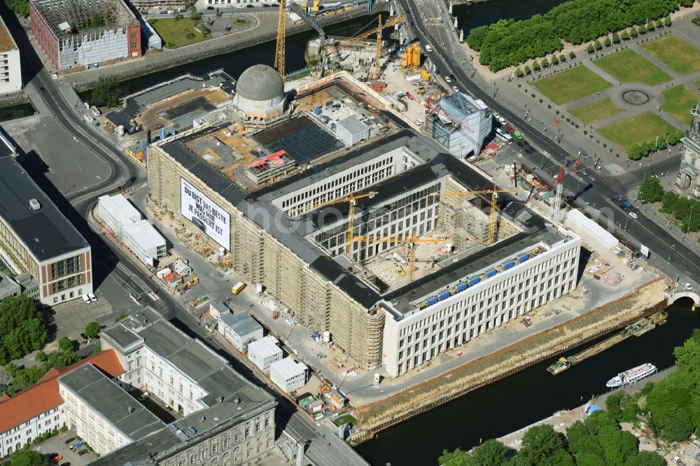 Berlin from above - Construction site for the new building the largest and most important cultural construction of the Federal Republic, the building of the Humboldt Forum in the form of the Berlin Palace