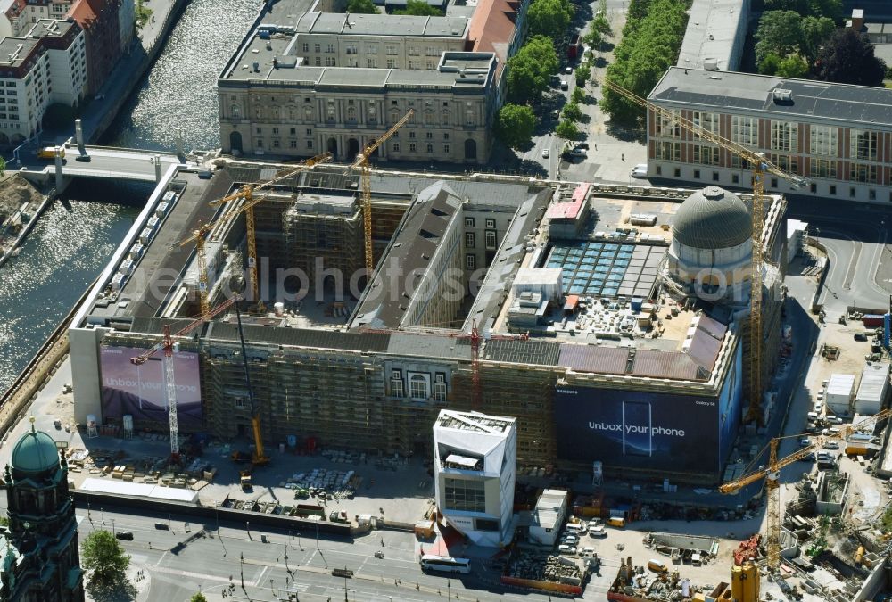 Berlin from above - Construction site for the new building the largest and most important cultural construction of the Federal Republic, the building of the Humboldt Forum in the form of the Berlin Palace