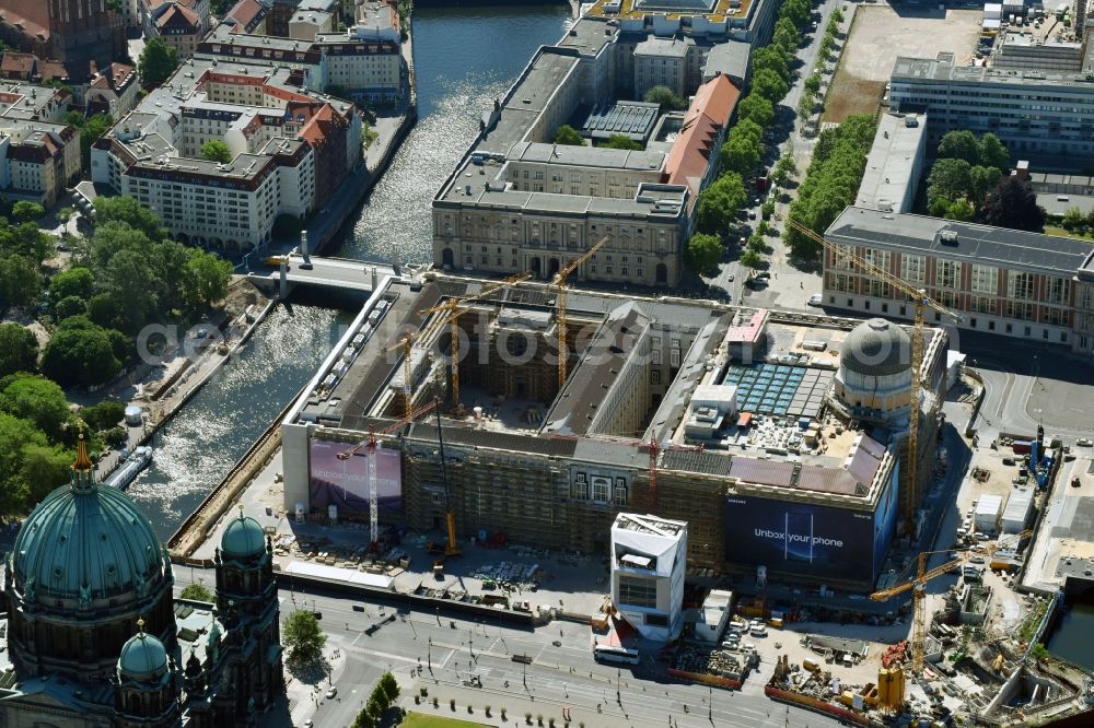 Berlin from the bird's eye view: Construction site for the new building the largest and most important cultural construction of the Federal Republic, the building of the Humboldt Forum in the form of the Berlin Palace