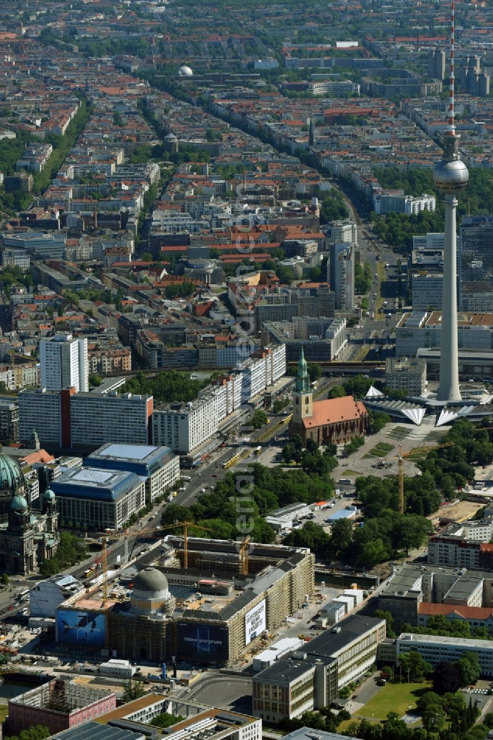 Berlin from above - Construction site for the new building the largest and most important cultural construction of the Federal Republic, the building of the Humboldt Forum in the form of the Berlin Palace