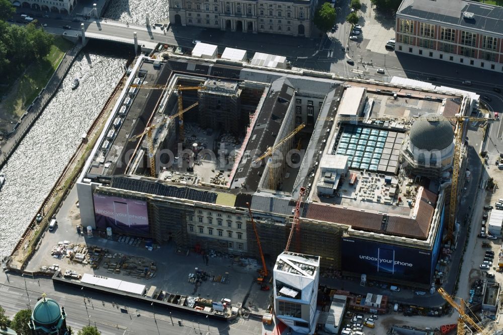 Berlin from above - Construction site for the new building the largest and most important cultural construction of the Federal Republic, the building of the Humboldt Forum in the form of the Berlin Palace