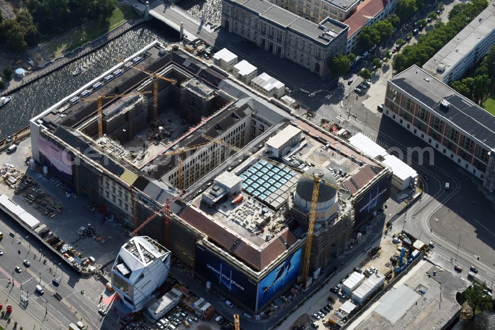 Berlin from the bird's eye view: Construction site for the new building the largest and most important cultural construction of the Federal Republic, the building of the Humboldt Forum in the form of the Berlin Palace