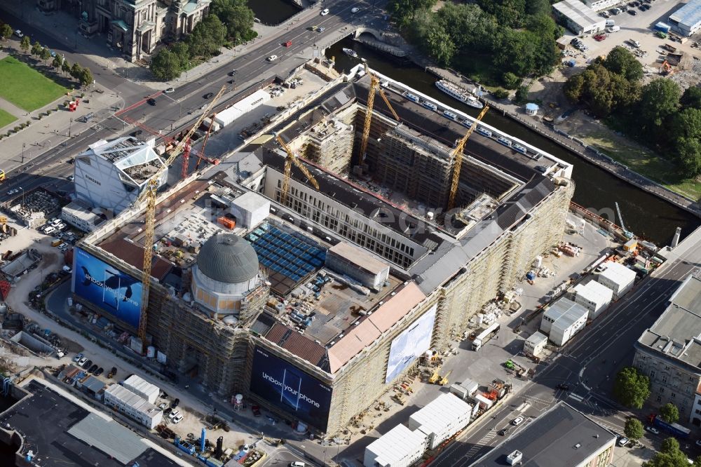 Berlin from the bird's eye view: Construction site for the new building the largest and most important cultural construction of the Federal Republic, the building of the Humboldt Forum in the form of the Berlin Palace