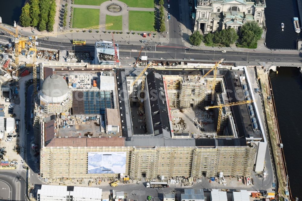 Berlin from the bird's eye view: Construction site for the new building the largest and most important cultural construction of the Federal Republic, the building of the Humboldt Forum in the form of the Berlin Palace