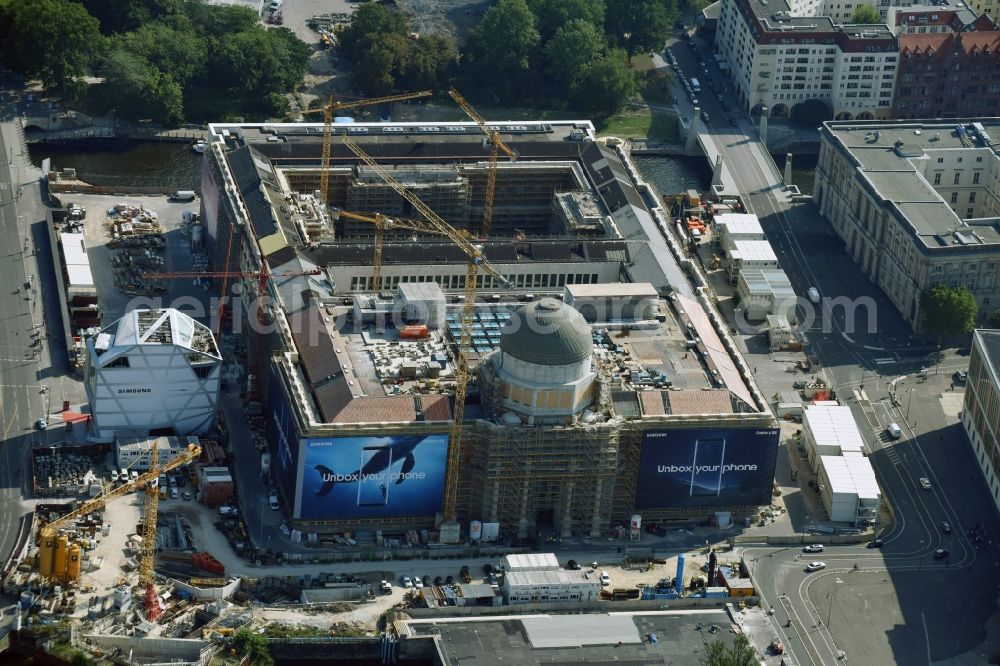 Berlin from the bird's eye view: Construction site for the new building the largest and most important cultural construction of the Federal Republic, the building of the Humboldt Forum in the form of the Berlin Palace