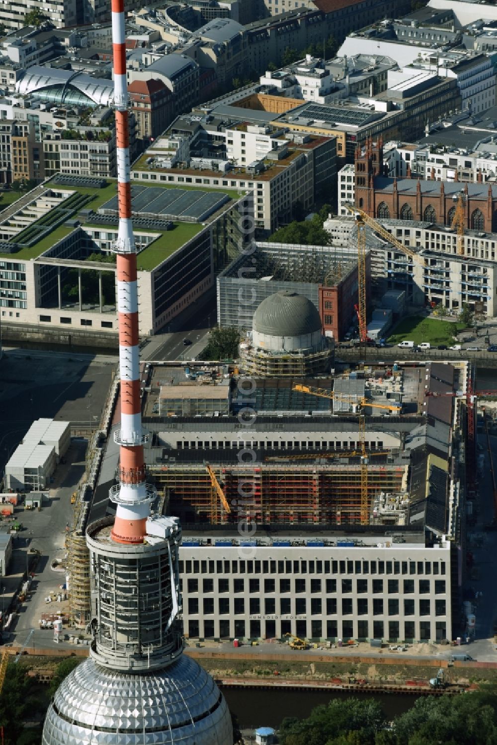 Berlin from above - Construction site for the new building the largest and most important cultural construction of the Federal Republic, the building of the Humboldt Forum in the form of the Berlin Palace