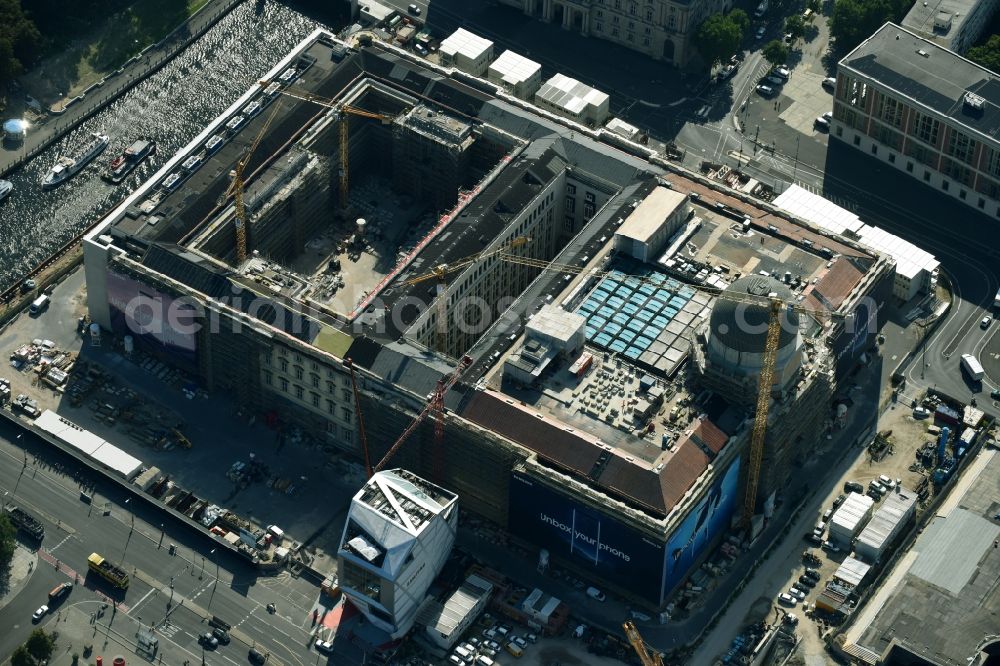 Berlin from the bird's eye view: Construction site for the new building the largest and most important cultural construction of the Federal Republic, the building of the Humboldt Forum in the form of the Berlin Palace