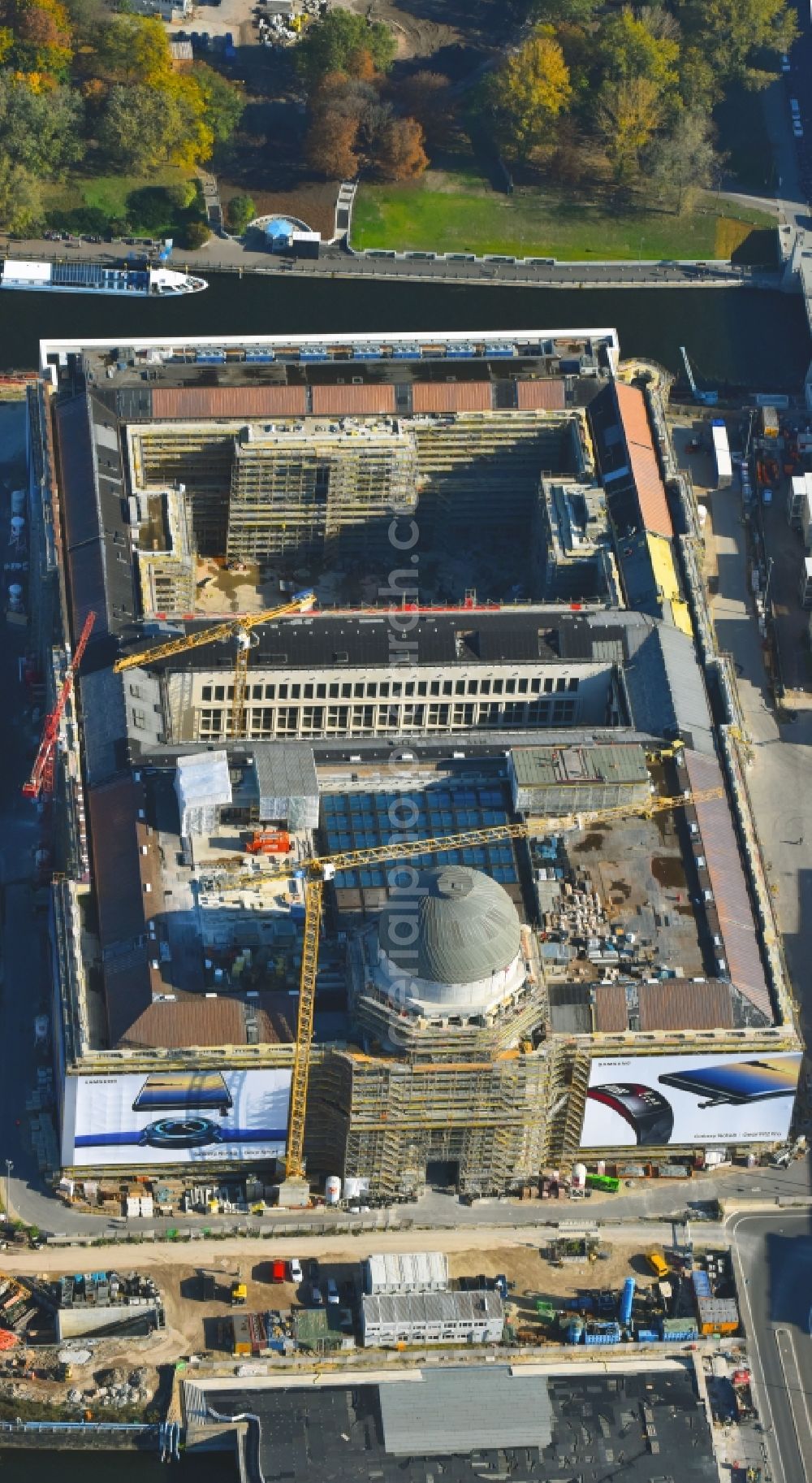 Berlin from above - Construction site for the new building the largest and most important cultural construction of the Federal Republic, the building of the Humboldt Forum in the form of the Berlin Palace