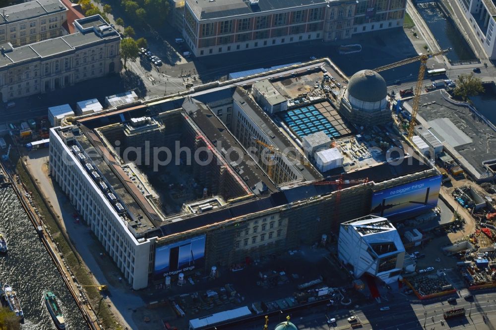 Berlin from above - Construction site for the new building the largest and most important cultural construction of the Federal Republic, the building of the Humboldt Forum in the form of the Berlin Palace