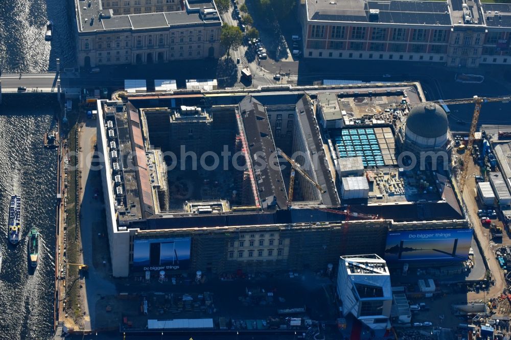 Berlin from the bird's eye view: Construction site for the new building the largest and most important cultural construction of the Federal Republic, the building of the Humboldt Forum in the form of the Berlin Palace