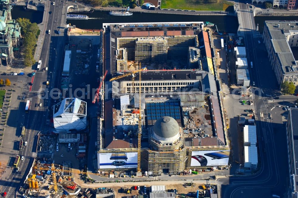 Berlin from the bird's eye view: Construction site for the new building the largest and most important cultural construction of the Federal Republic, the building of the Humboldt Forum in the form of the Berlin Palace