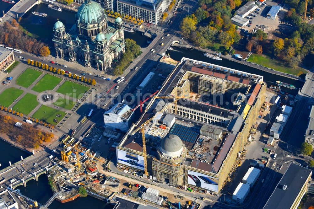 Berlin from above - Construction site for the new building the largest and most important cultural construction of the Federal Republic, the building of the Humboldt Forum in the form of the Berlin Palace