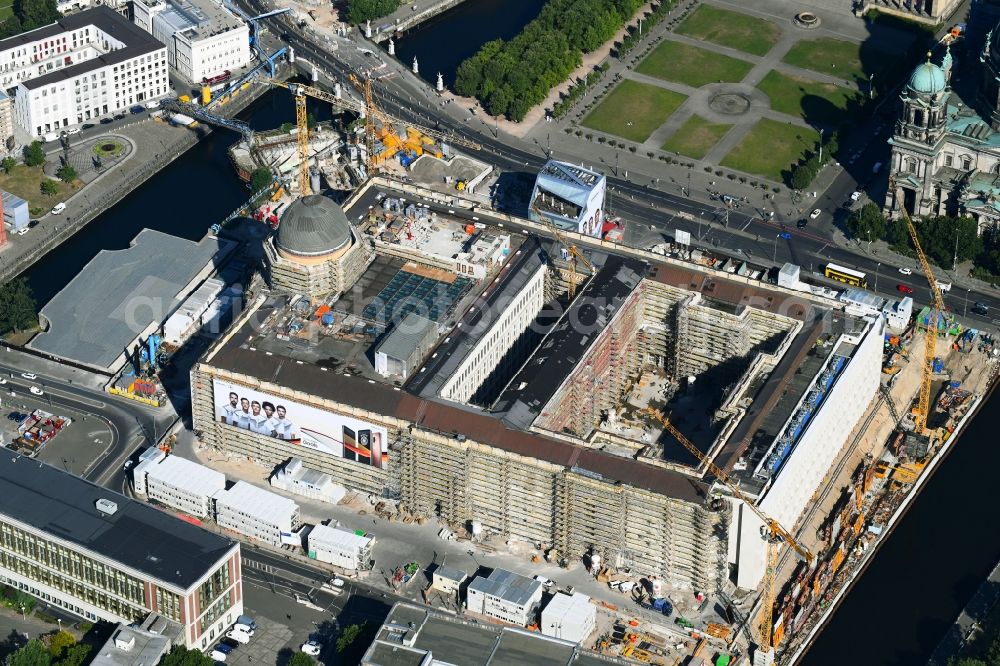 Berlin from above - Construction site for the new building the largest and most important cultural construction of the Federal Republic, the building of the Humboldt Forum in the form of the Berlin Palace