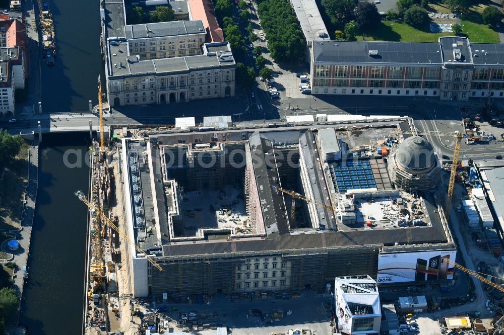 Berlin from above - Construction site for the new building the largest and most important cultural construction of the Federal Republic, the building of the Humboldt Forum in the form of the Berlin Palace