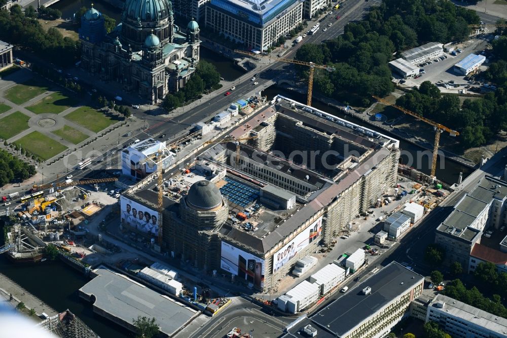 Berlin from above - Construction site for the new building the largest and most important cultural construction of the Federal Republic, the building of the Humboldt Forum in the form of the Berlin Palace