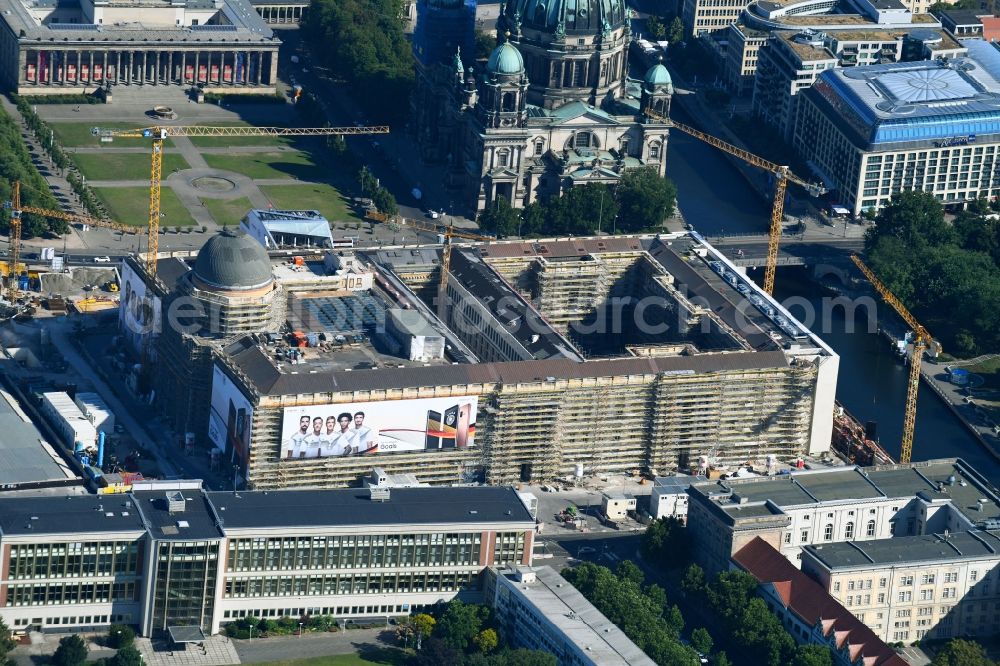 Berlin from above - Construction site for the new building the largest and most important cultural construction of the Federal Republic, the building of the Humboldt Forum in the form of the Berlin Palace