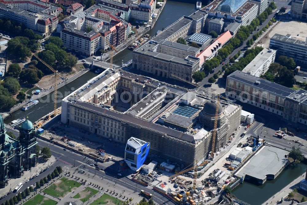 Berlin from above - Construction site for the new building the largest and most important cultural construction of the Federal Republic, the building of the Humboldt Forum in the form of the Berlin Palace