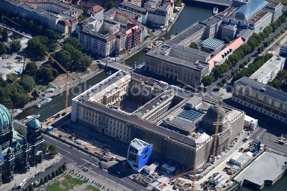 Berlin from the bird's eye view: Construction site for the new building the largest and most important cultural construction of the Federal Republic, the building of the Humboldt Forum in the form of the Berlin Palace