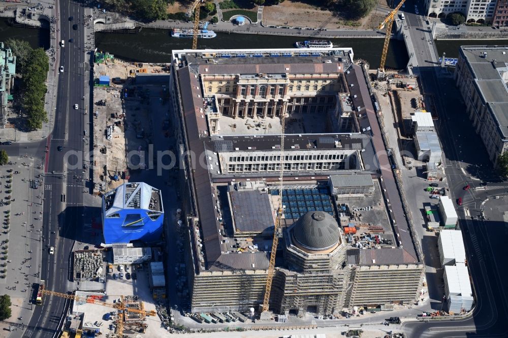 Berlin from the bird's eye view: Construction site for the new building the largest and most important cultural construction of the Federal Republic, the building of the Humboldt Forum in the form of the Berlin Palace