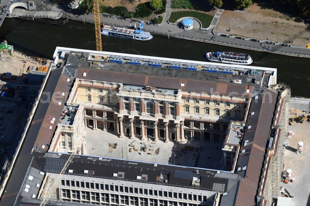 Berlin from above - Construction site for the new building the largest and most important cultural construction of the Federal Republic, the building of the Humboldt Forum in the form of the Berlin Palace