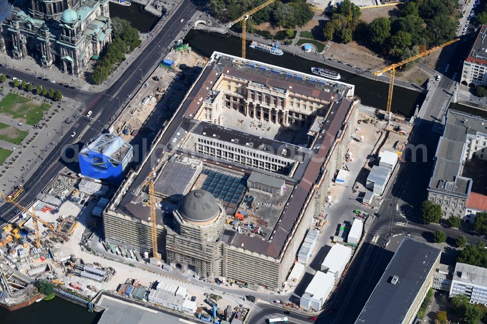 Berlin from the bird's eye view: Construction site for the new building the largest and most important cultural construction of the Federal Republic, the building of the Humboldt Forum in the form of the Berlin Palace