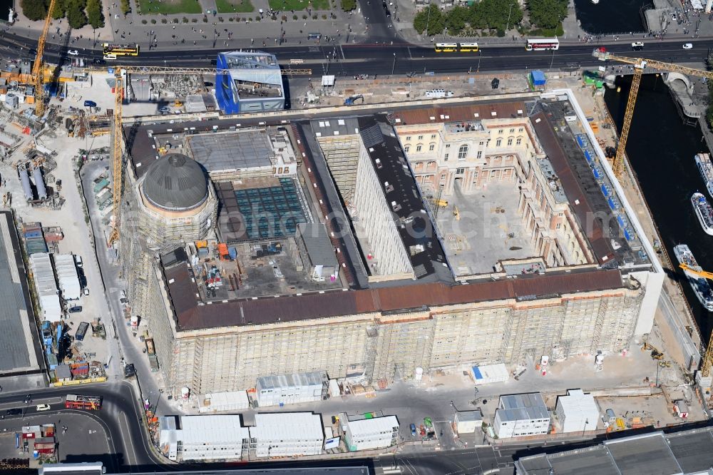 Berlin from above - Construction site for the new building the largest and most important cultural construction of the Federal Republic, the building of the Humboldt Forum in the form of the Berlin Palace