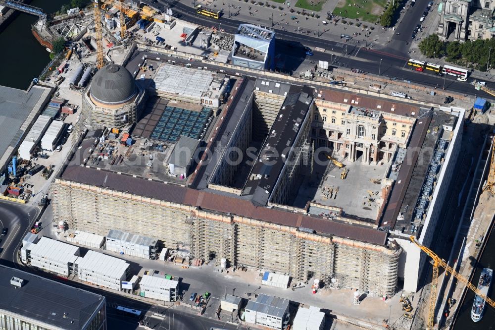 Berlin from above - Construction site for the new building the largest and most important cultural construction of the Federal Republic, the building of the Humboldt Forum in the form of the Berlin Palace