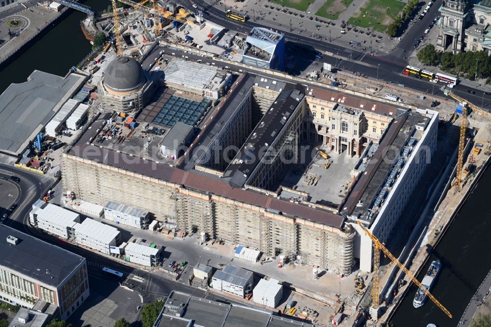 Berlin from the bird's eye view: Construction site for the new building the largest and most important cultural construction of the Federal Republic, the building of the Humboldt Forum in the form of the Berlin Palace