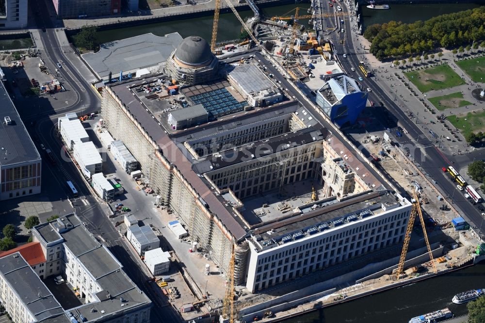 Berlin from above - Construction site for the new building the largest and most important cultural construction of the Federal Republic, the building of the Humboldt Forum in the form of the Berlin Palace