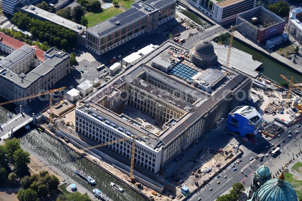 Berlin from the bird's eye view: Construction site for the new building the largest and most important cultural construction of the Federal Republic, the building of the Humboldt Forum in the form of the Berlin Palace