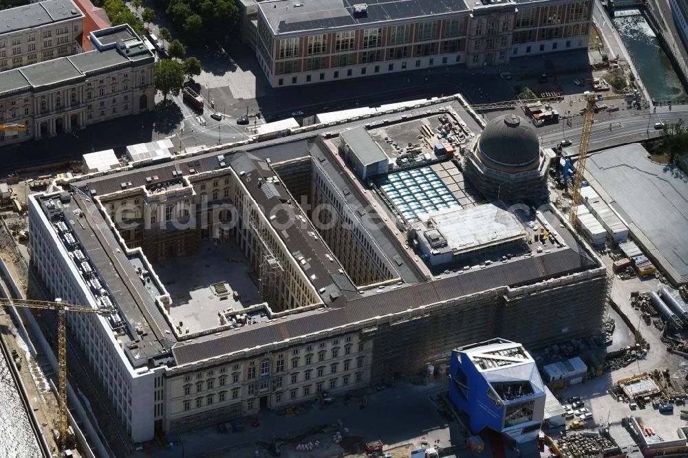 Berlin from above - Construction site for the new building the largest and most important cultural construction of the Federal Republic, the building of the Humboldt Forum in the form of the Berlin Palace