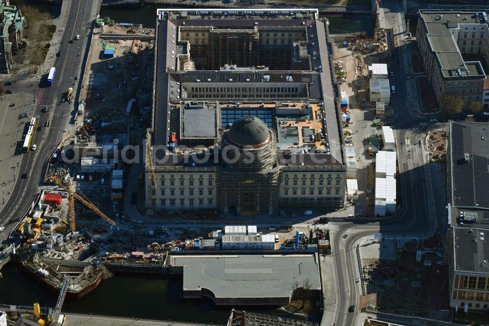 Berlin from above - Construction site for the new building the largest and most important cultural construction of the Federal Republic, the building of the Humboldt Forum in the form of the Berlin Palace