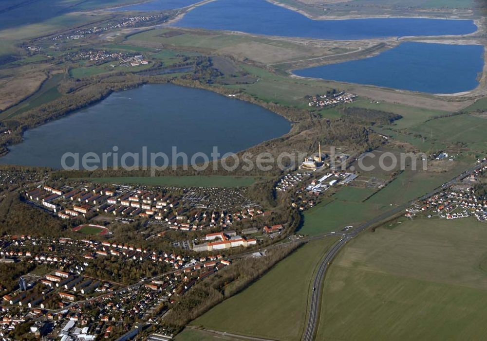 Borna from above - Blick auf Borna Nord und das Umland nordlich von Borna: Speicherbecken, den Haubitzer See mit dem davor liegenden Haubitz und den Hainer See.