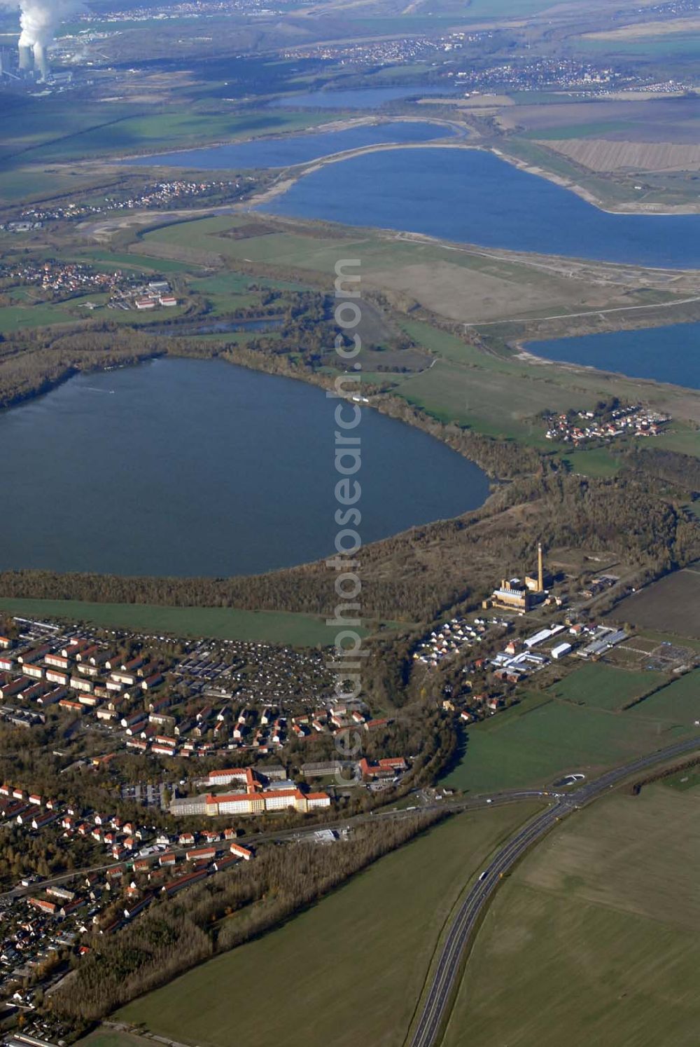 Aerial image Borna - Blick auf Borna Nord und das Umland nordlich von Borna: Speicherbecken, den Haubitzer See mit dem davor liegenden Haubitz und den Hainer See.