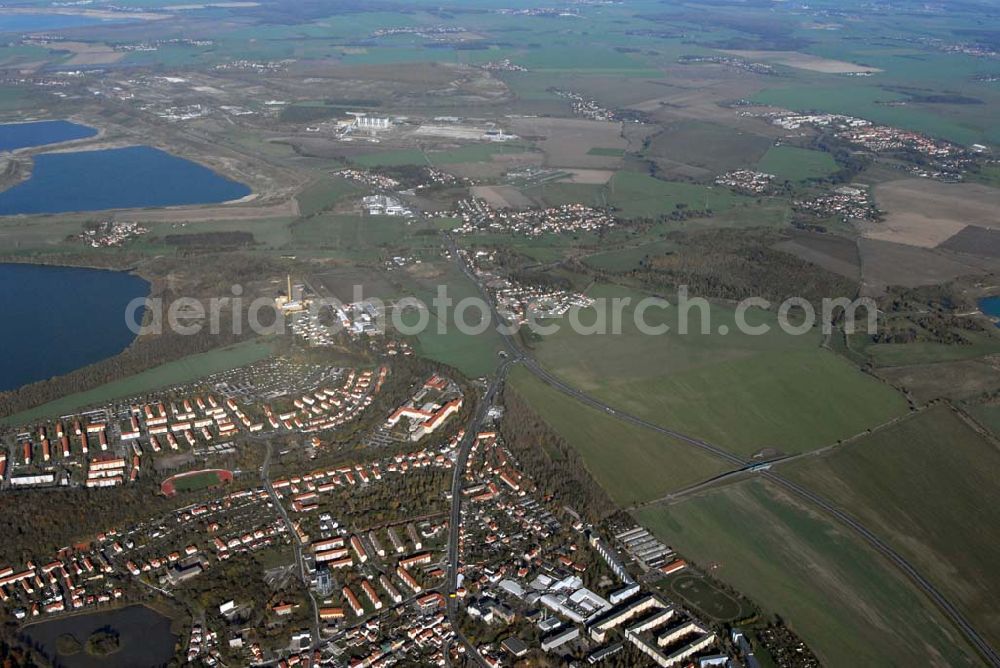 Borna from above - Blick auf das Umland nordlich von Borna und Borna Nord: Speicherbecken, den Haubitzer See mit dem davor liegenden Haubitz und den Hainer See sowie die Orte Eula und Kesselshain.