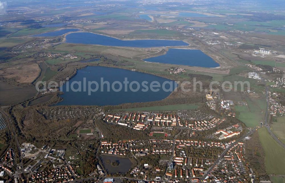 Borna from the bird's eye view: Blick auf das Umland nordlich von Borna und Borna Nord: Speicherbecken, den Haubitzer See mit dem davor liegenden Haubitz und den Hainer See sowie die Orte Eula und Kesselshain.